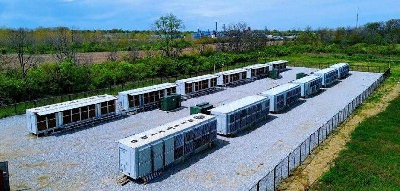 Rows of modular data center containers at an operating site