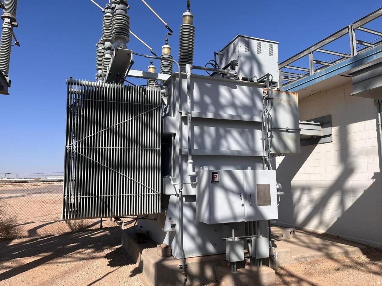 High-voltage transformer and substation equipment at a West Texas site